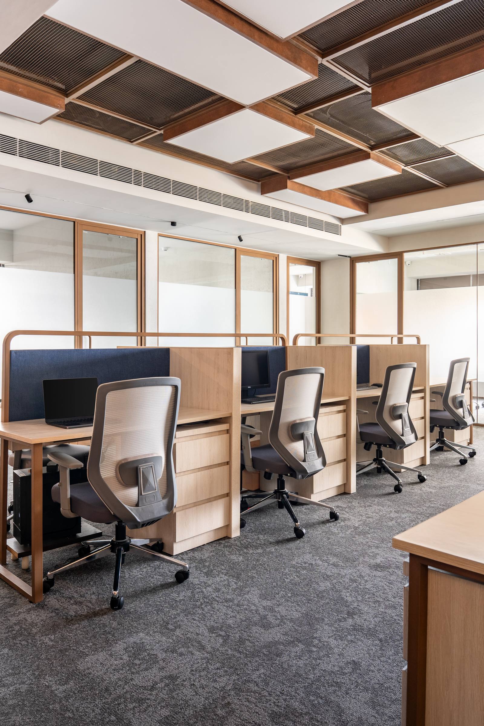 Open-plan commercial workspace with collaborative desking by Beyond Briks Open-plan commercial workspace with collaborative desking by Beyond Briks