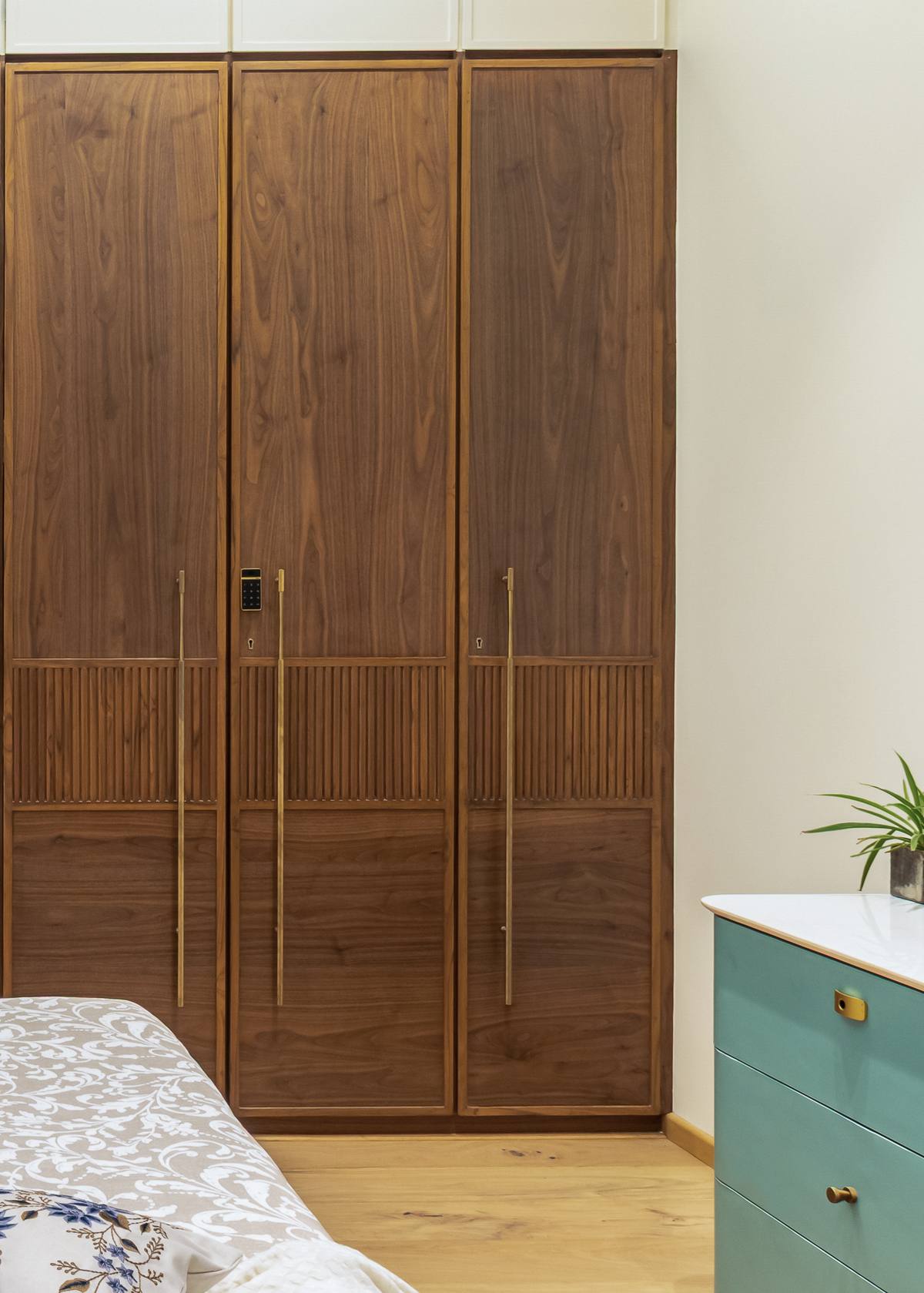Bedroom suite makeover with custom wardrobe in a luxury bungalow by Beyond Briks